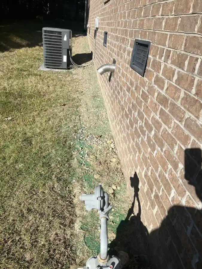 a crawl space vent seen from the exterior